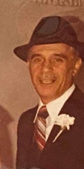 Portrait of YoungPa wearing a hat.